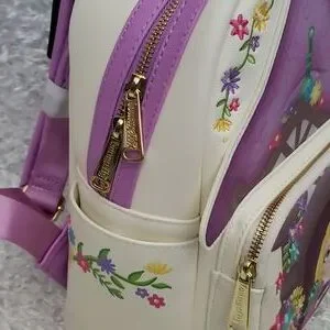 NWT Loungefly Tangled (reduced slight flaw) Rapunzel 10 year anniversary edition Loungefly | Bags | Nwt Loungefly Tangled Reduced Slight Flaw  main image 3